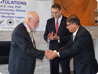 Dr. Jack Ives congratulated by  H.E. Kali Prasad Pokhrel